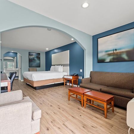 Executive Inn & Suites Magnolia Esterno foto