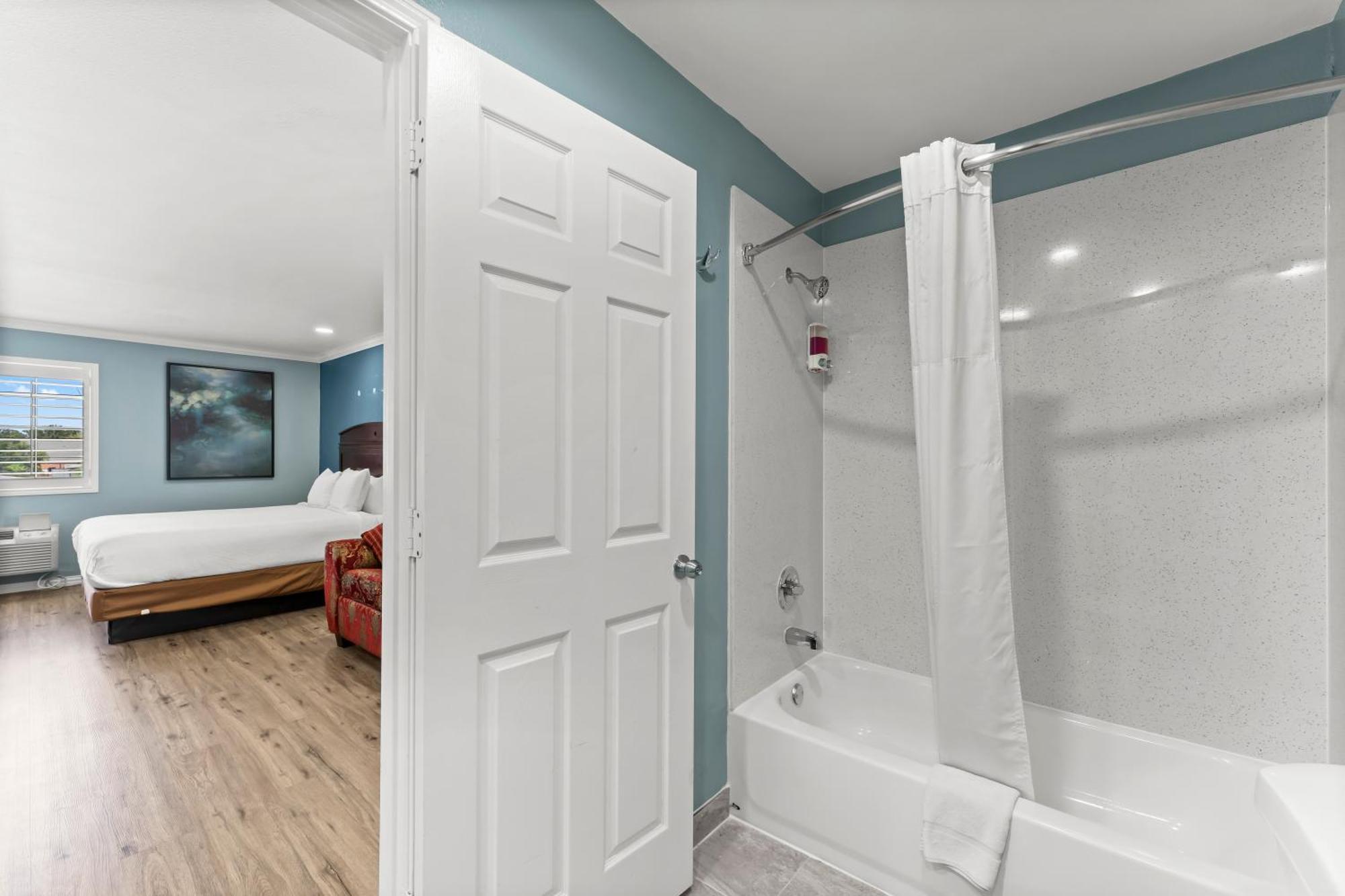 Executive Inn & Suites Magnolia Esterno foto