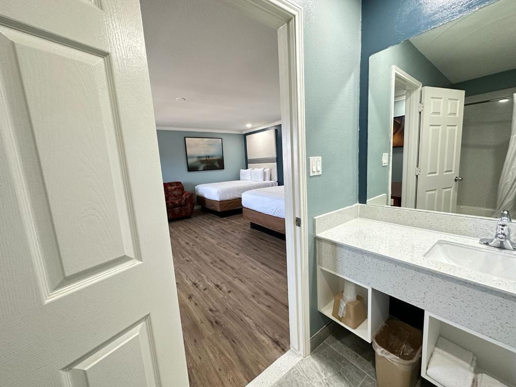 Executive Inn & Suites Magnolia Esterno foto
