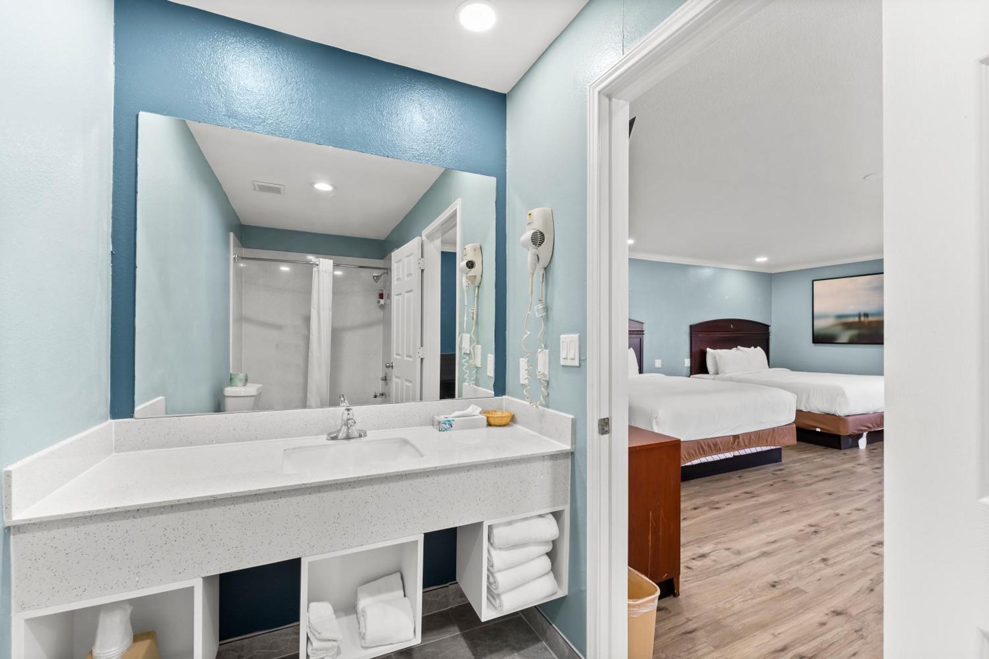 Executive Inn & Suites Magnolia Esterno foto