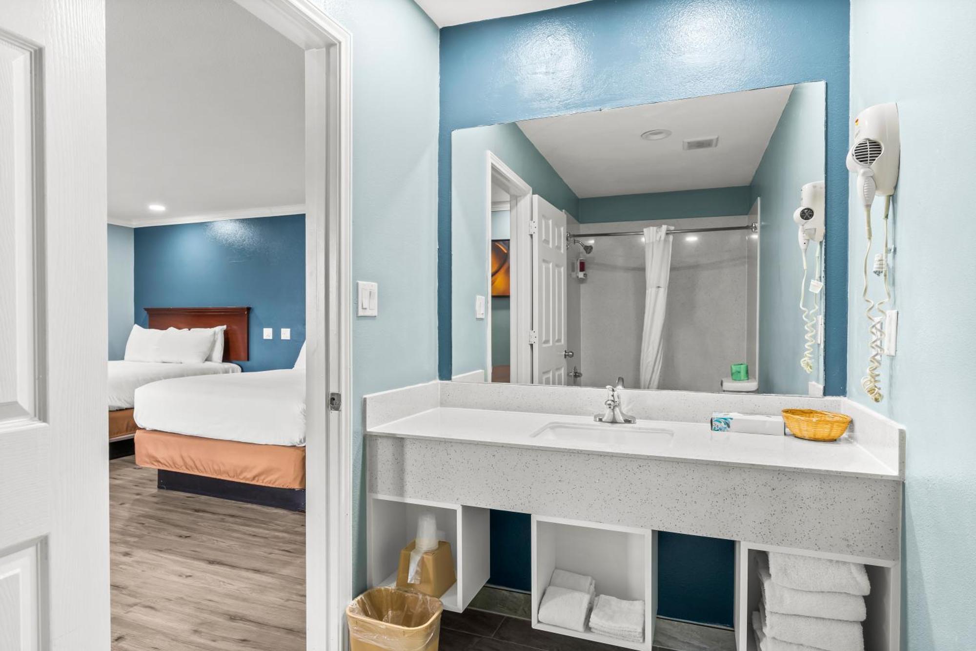 Executive Inn & Suites Magnolia Esterno foto