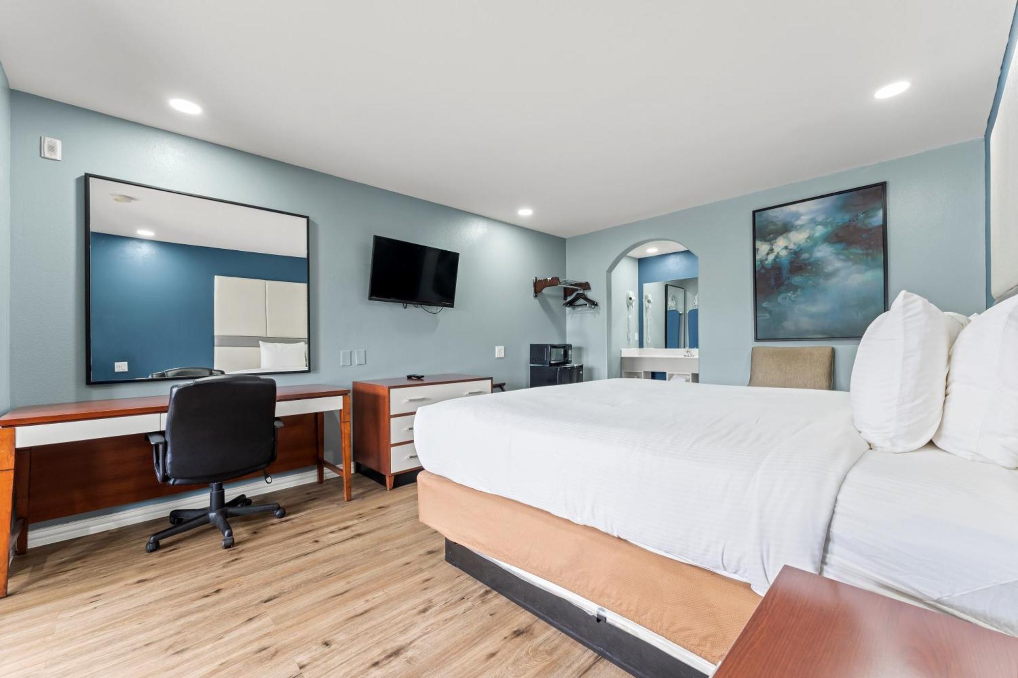 Executive Inn & Suites Magnolia Esterno foto