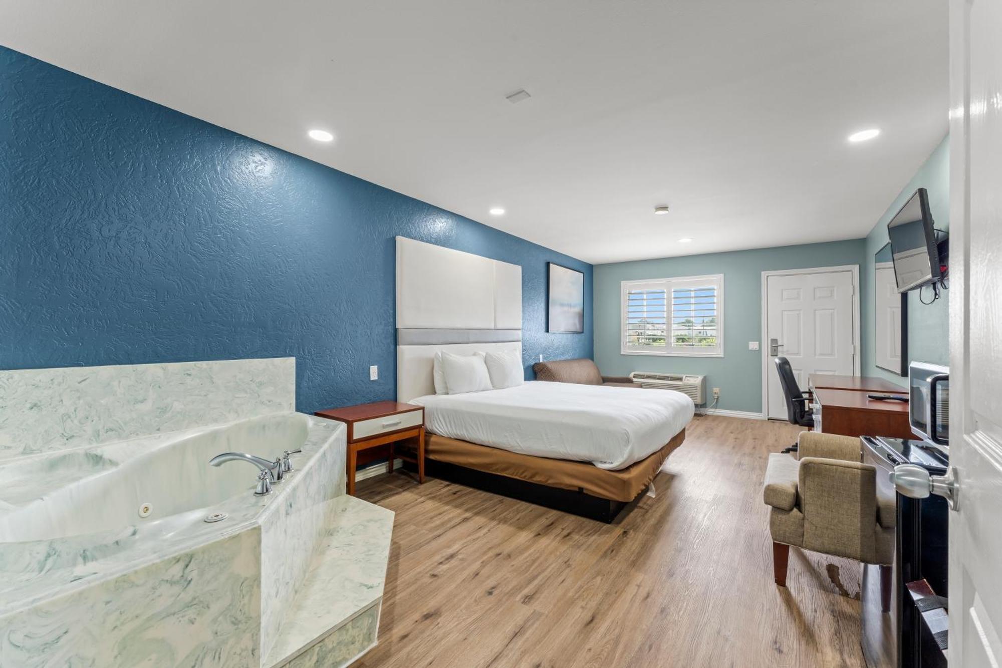 Executive Inn & Suites Magnolia Esterno foto