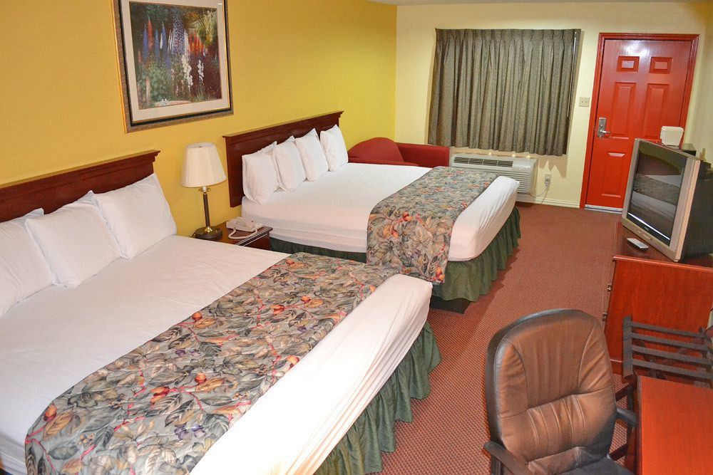 Executive Inn & Suites Magnolia Esterno foto