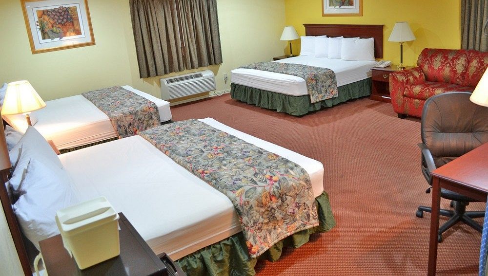 Executive Inn & Suites Magnolia Esterno foto