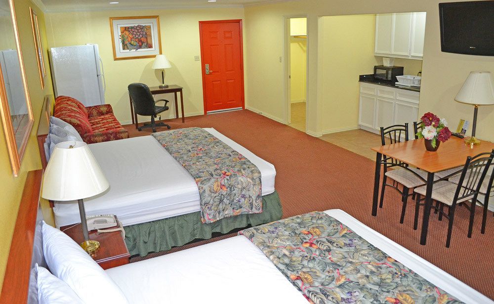 Executive Inn & Suites Magnolia Esterno foto