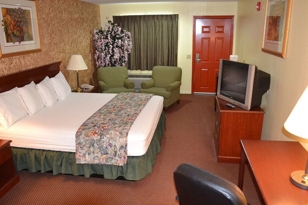 Executive Inn & Suites Magnolia Esterno foto